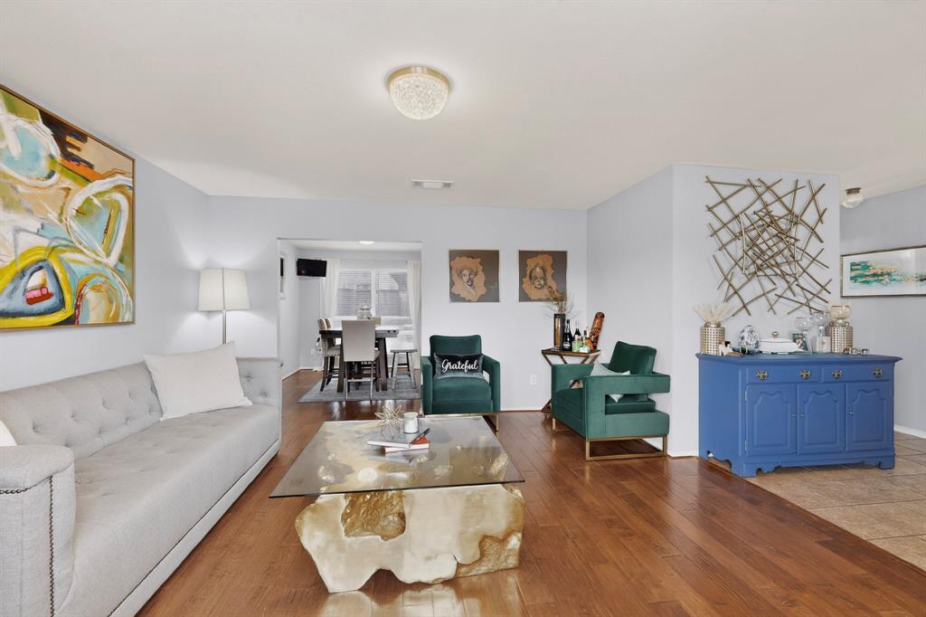 3825 Clay Mathis Road Mesquite, TX 75181 - Photo 6 of 39 a living room with furniture and wooden floor
