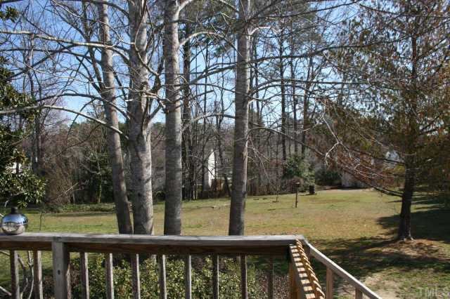 3420 Cartway Lane Raleigh, NC 27616 - Photo 3 of 7 a view of a backyard with large trees