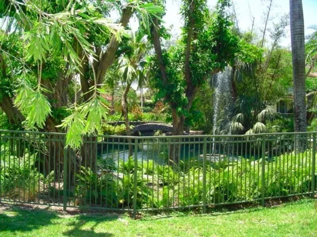 a view of a lake with a big yard