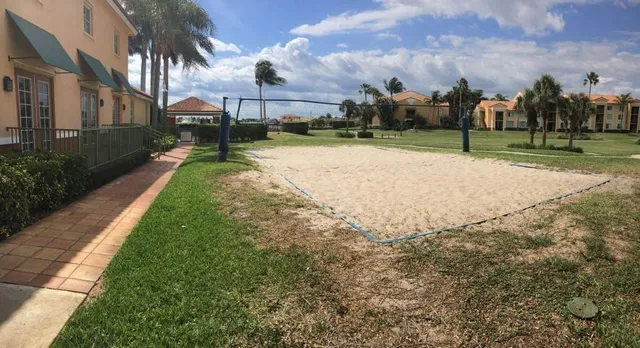 a view of a street with houses on both side