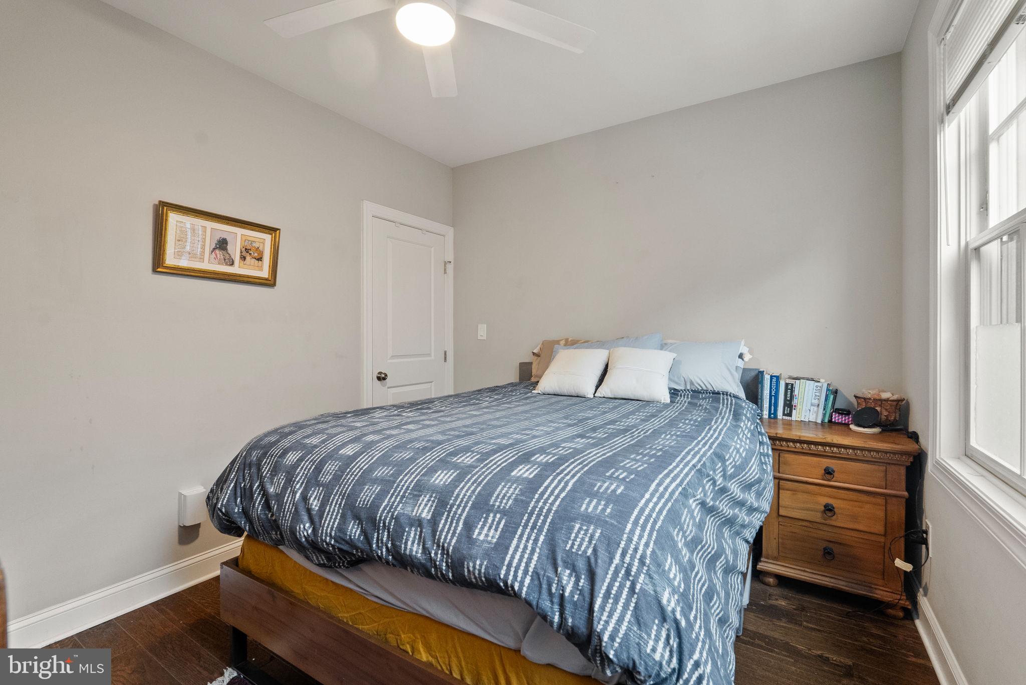1018 13th Street Southeast, Unit 2 Washington, DC 20003 - Photo 22 of 30 a bedroom with a bed and a window