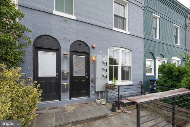 a front view of a house with a porch