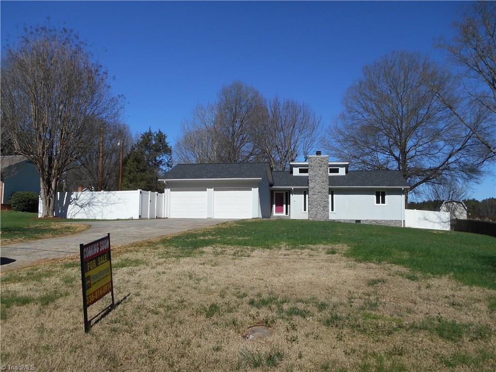 5929 Styers Ferry Road Clemmons, NC 27012 - Photo 1 of 28 Visualization is a key part of your home buying experience. As you are looking at these pictures, take a minute and see yourself in each photo, moving from room to room. Be part of the picture, think thoughts of what you want, feel how it will be to live here and call it HOME! In this front view we can see the Vinyl Privacy Fence, the two car attached garage, the NEW roof, the nice front yard, the mature trees in the front and backyard.
