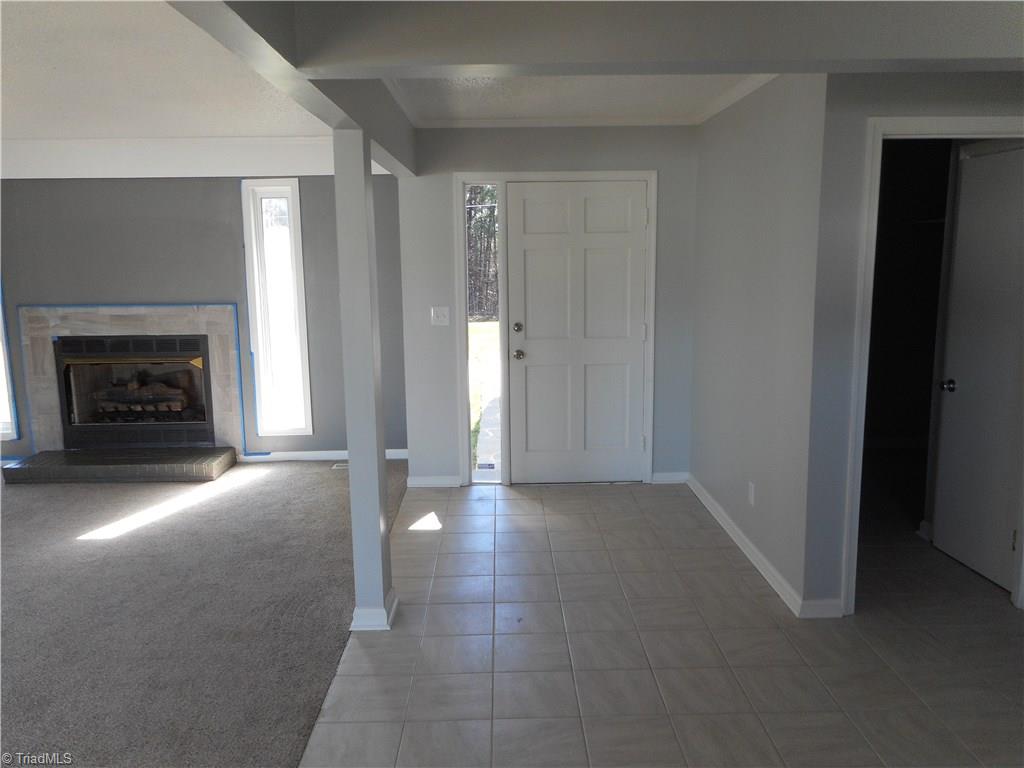 5929 Styers Ferry Road Clemmons, NC 27012 - Photo 26 of 28 This is the front entry way that is open to the living room, kitchen and dining room areas.