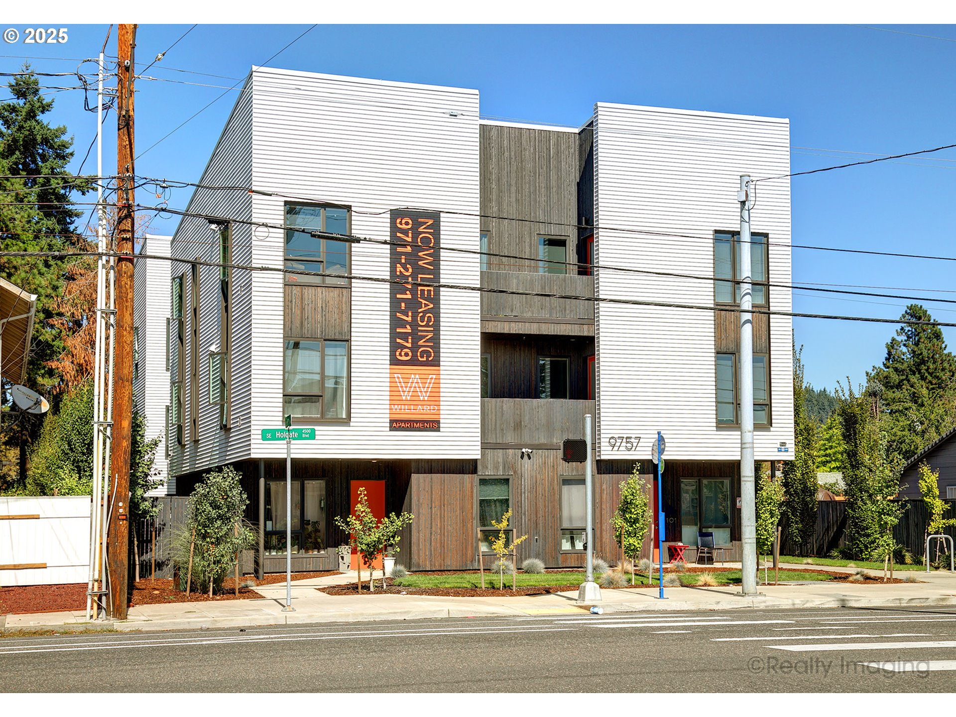 9757 Southeast Holgate Boulevard Portland, OR 97266 - Photo 1 of 16 a view of a building and a windows