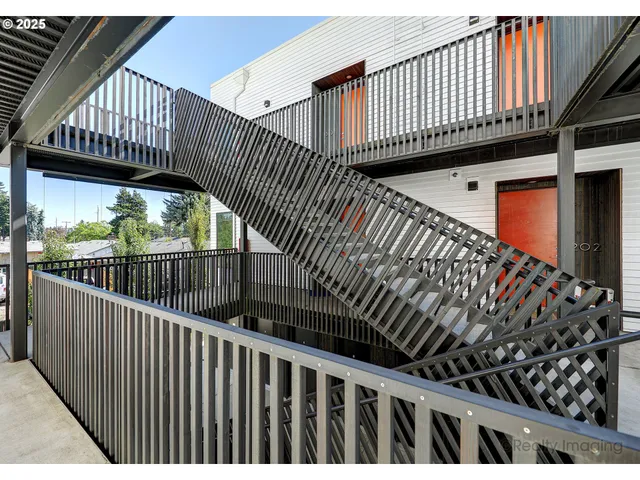 a view of balcony with wooden floor