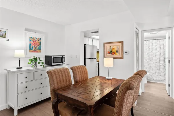 a view of a dining room with furniture