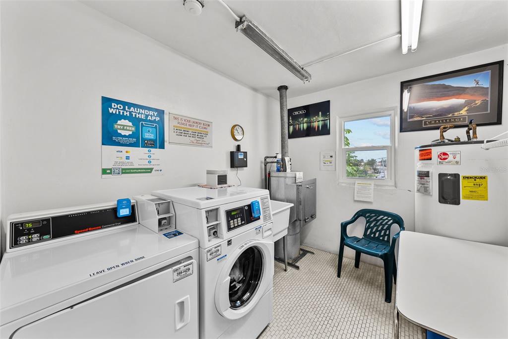 100 Waverly Way, Unit 403 Clearwater, FL 33756 - Photo 28 of 49 a view of living room with washer and dryer
