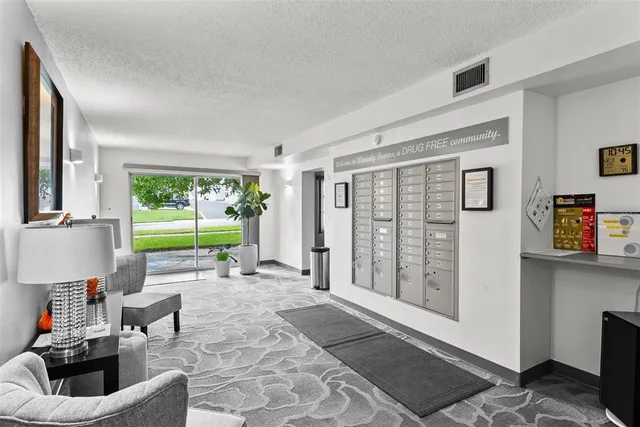 a living room with furniture and a garden