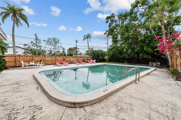a view of outdoor space and swimming pool