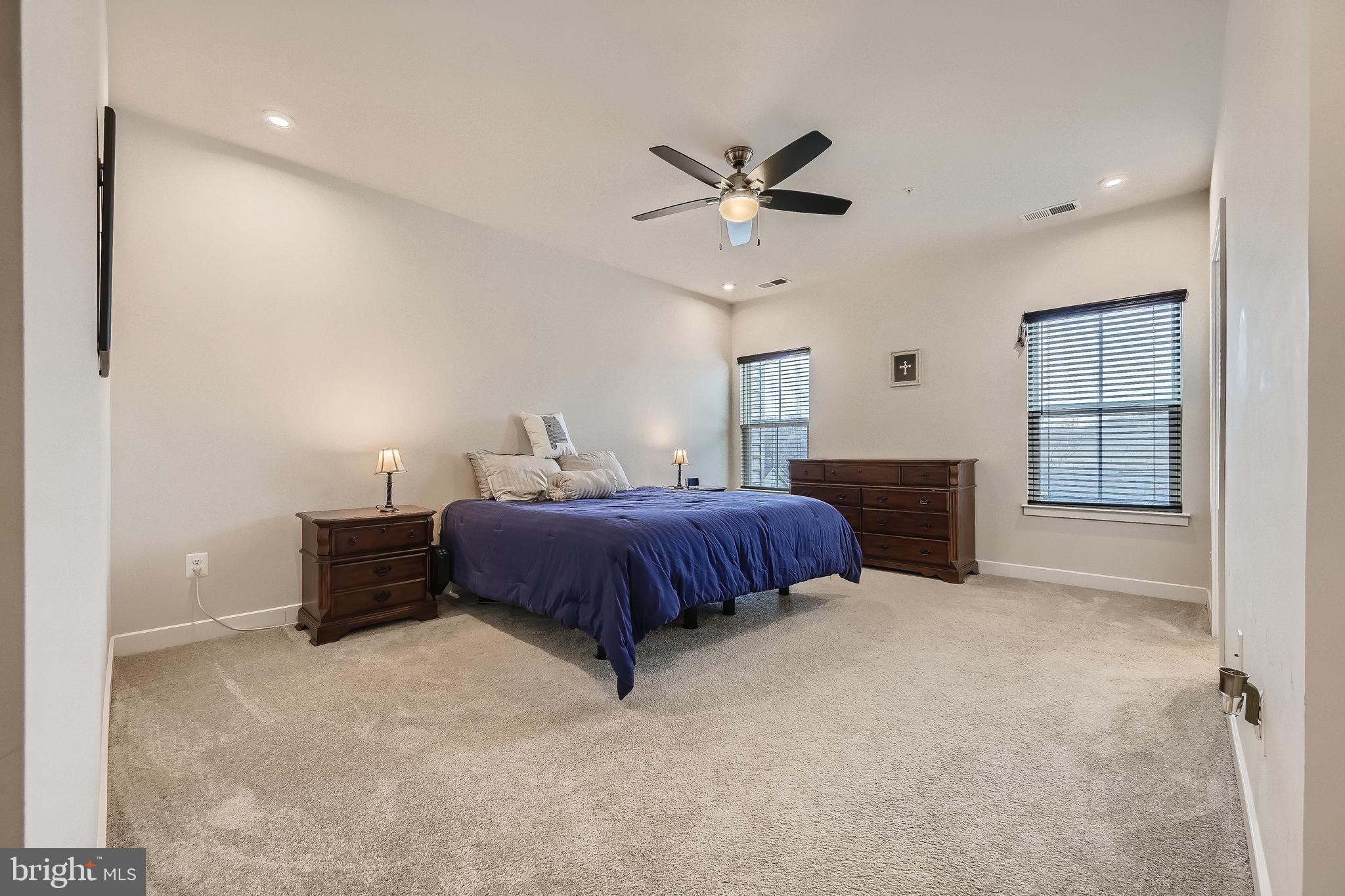 737 Iron Gate Road Bel Air, MD 21014 - Photo 14 of 27 a spacious bedroom with a bed and cabinet