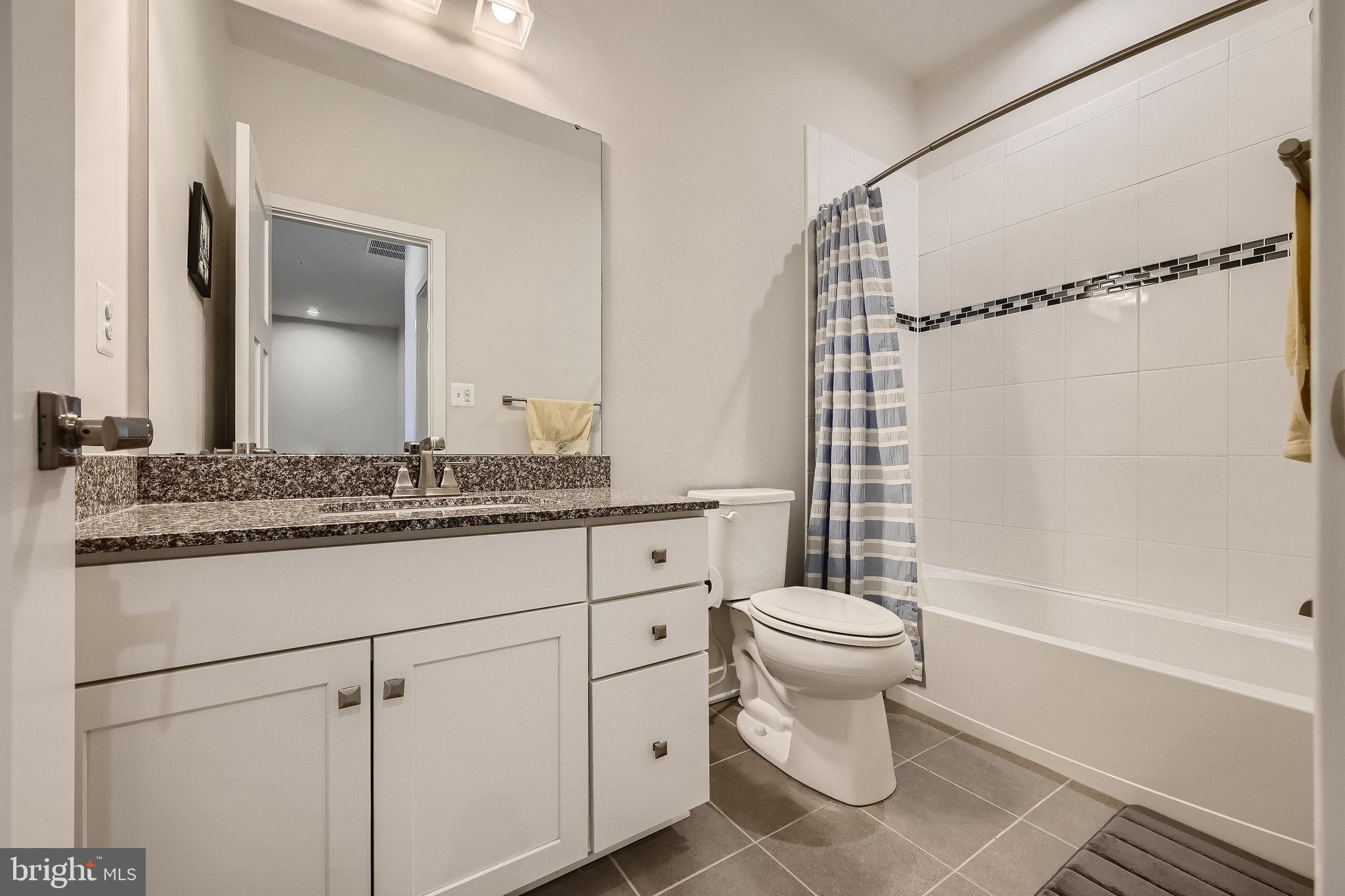 737 Iron Gate Road Bel Air, MD 21014 - Photo 19 of 27 a bathroom with a sink toilet and shower