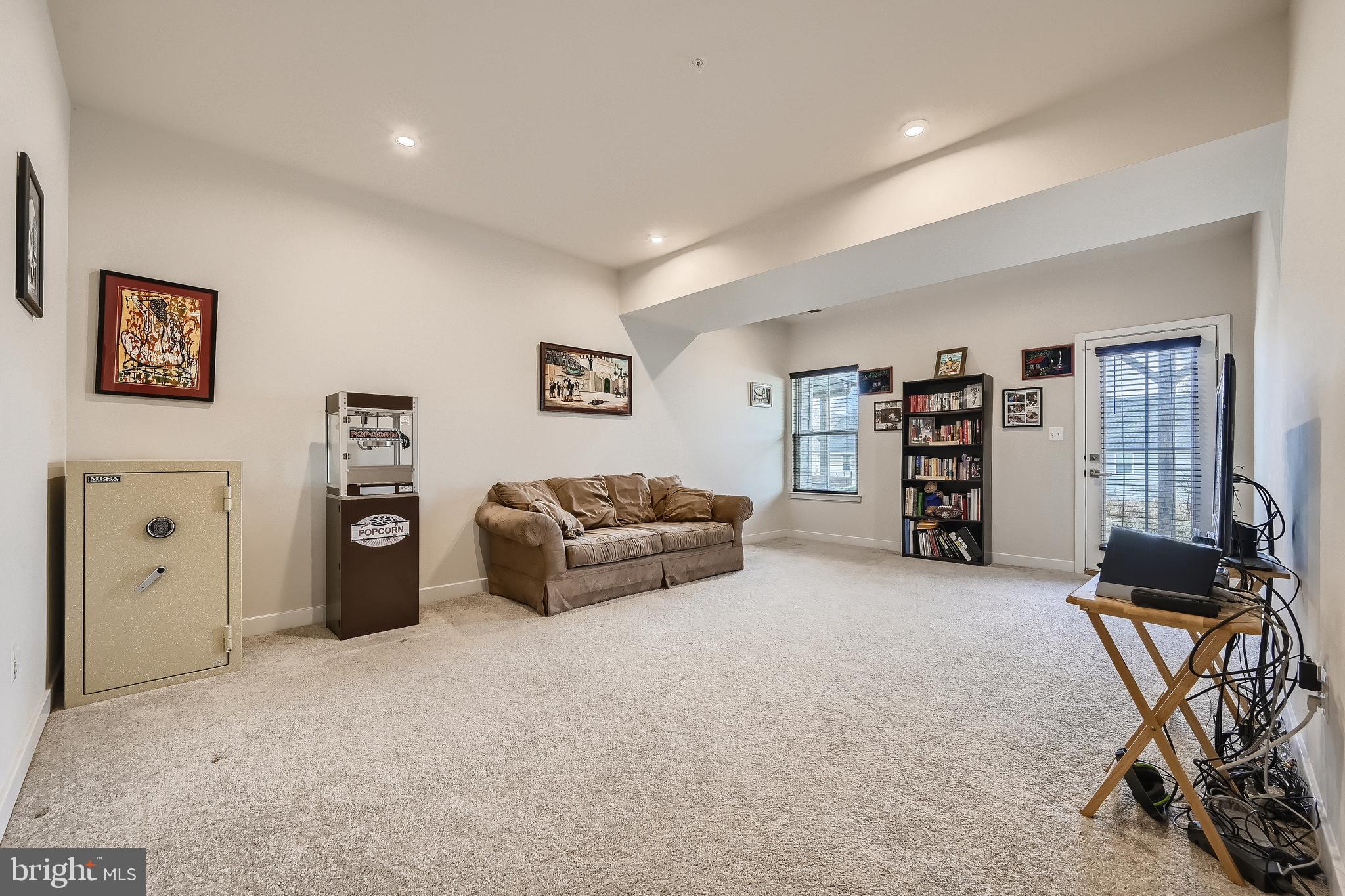 737 Iron Gate Road Bel Air, MD 21014 - Photo 22 of 27 a living room with furniture and a flat screen tv