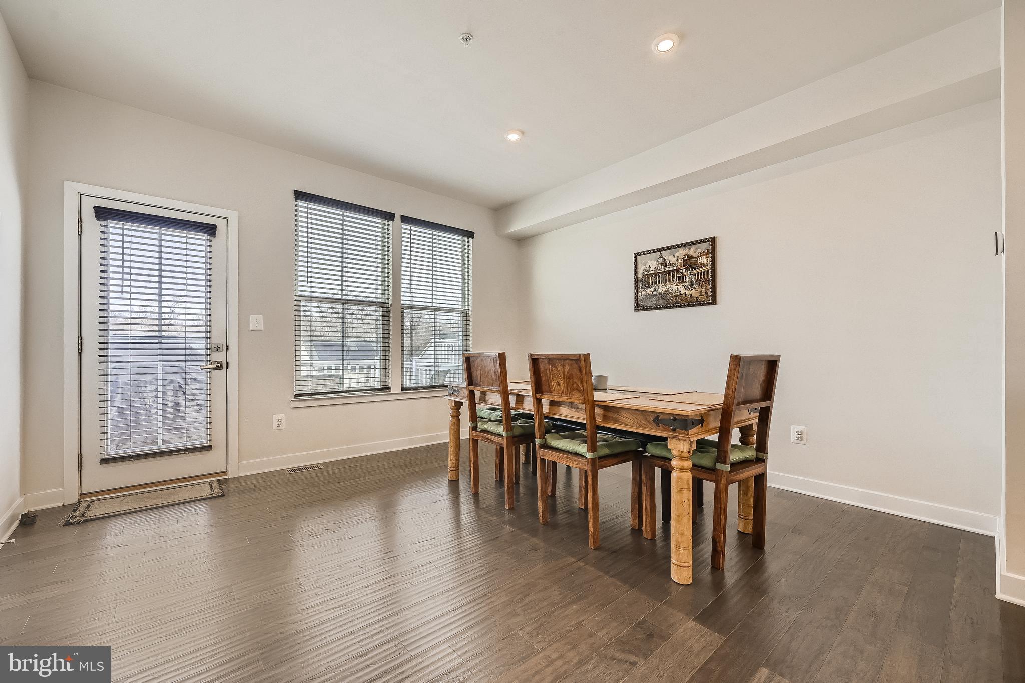 737 Iron Gate Road Bel Air, MD 21014 - Photo 7 of 27 a view of a dining room with furniture and wooden floor