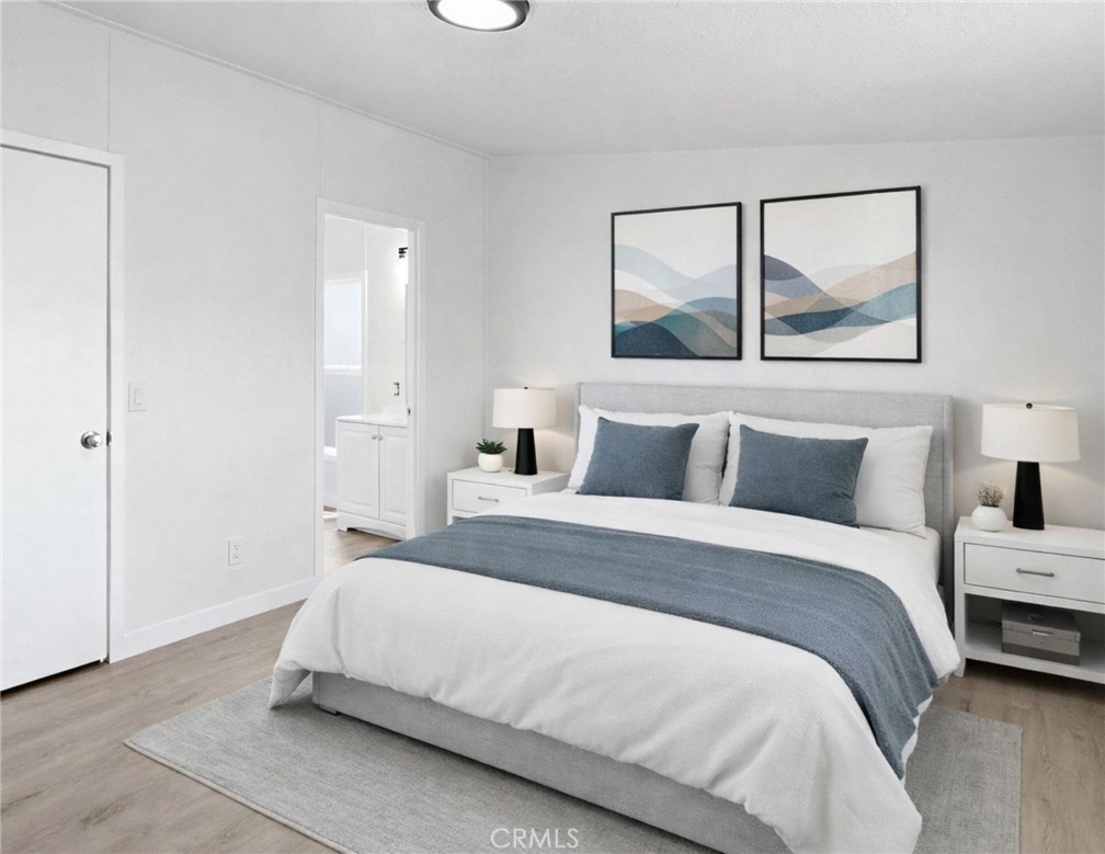 4849 Peck Road, Unit 13 El Monte, CA 91732 - Photo 31 of 32 Please note that the image shown is a virtually staged representation of the room and is intended to provide a visual concept of the space. The actual room may differ in appearance, and the furniture and decor depicted are not included in the sale. For an accurate understanding of the property's current condition and layout, we encourage you to view the home in person. Thank you