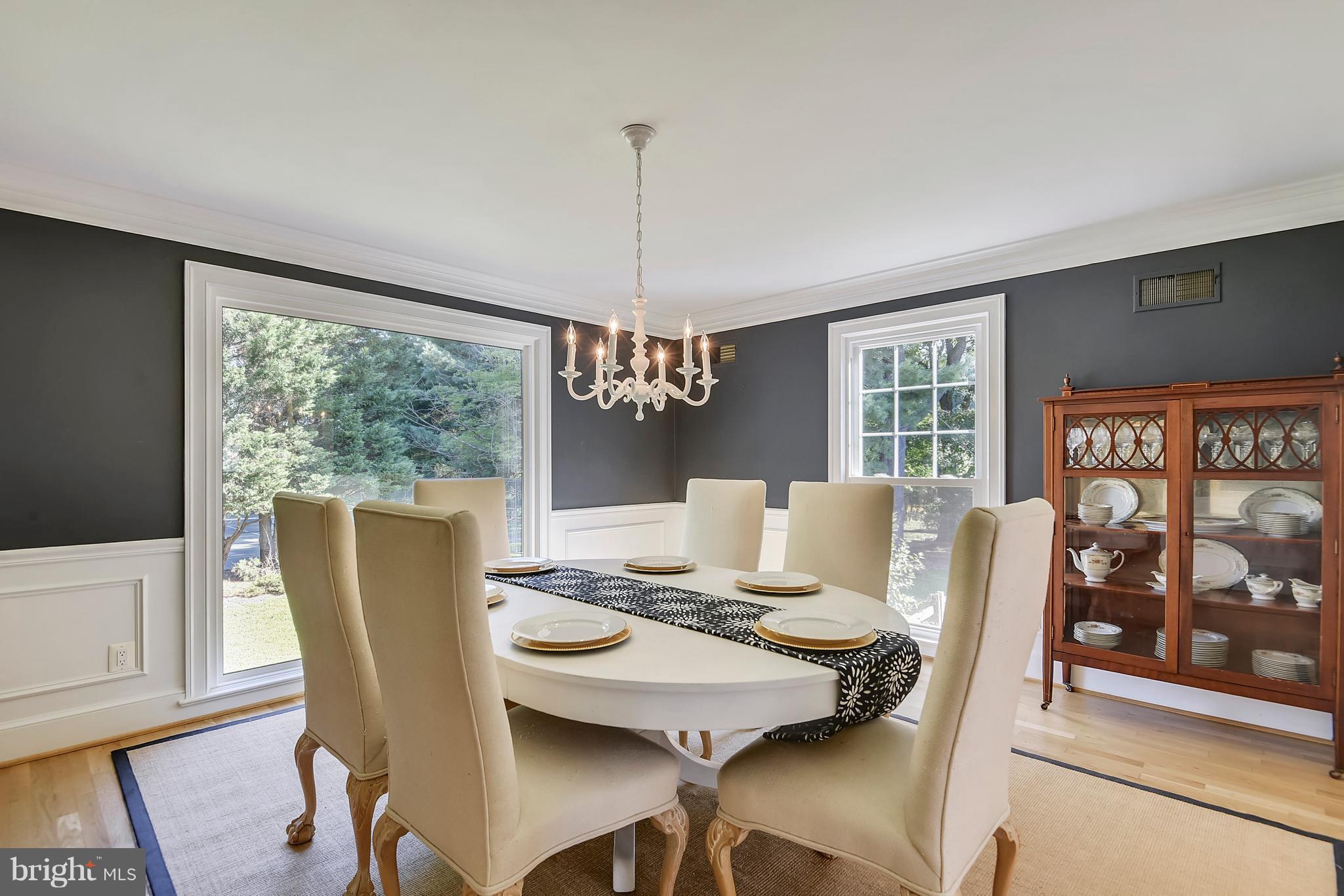12408 Beall Spring Road Potomac, MD 20854 - Photo 4 of 30 a view of a dining room with furniture window and outside view