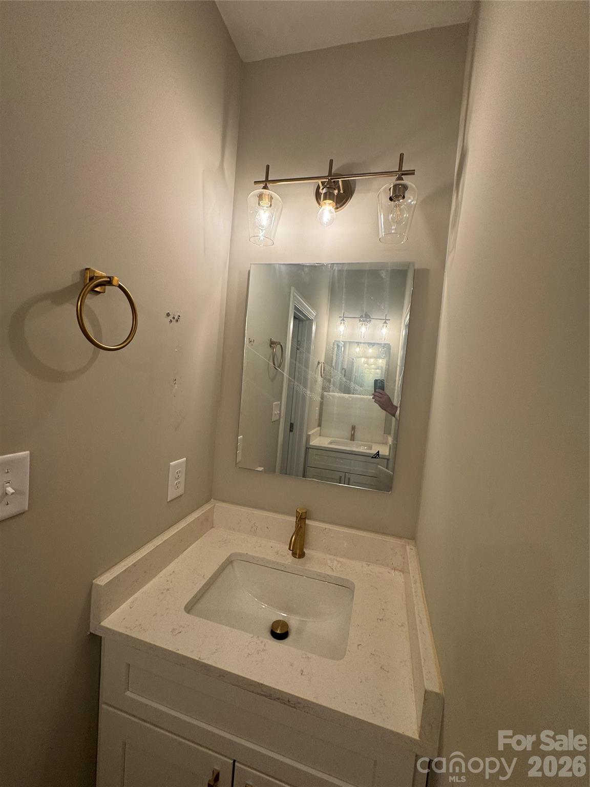 203 Lee Street Fort Mill, SC 29715 - Photo 15 of 16 a bathroom with a sink and a mirror