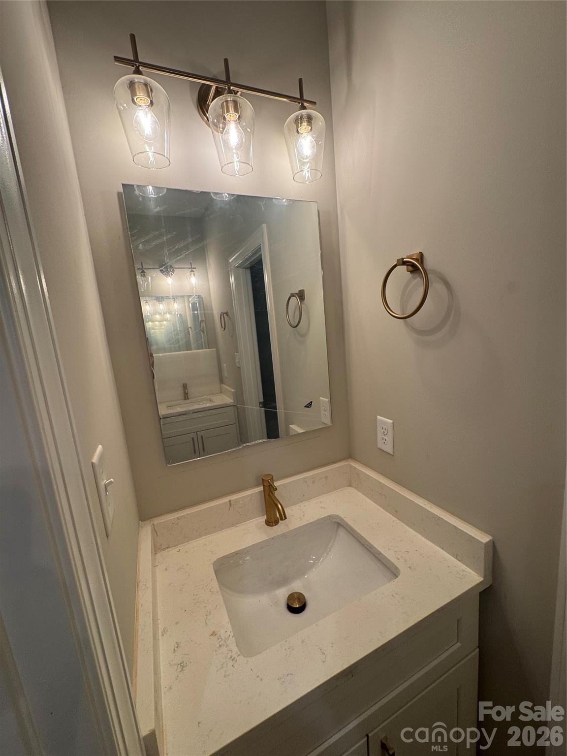 203 Lee Street Fort Mill, SC 29715 - Photo 16 of 16 a bathroom with a sink and mirror