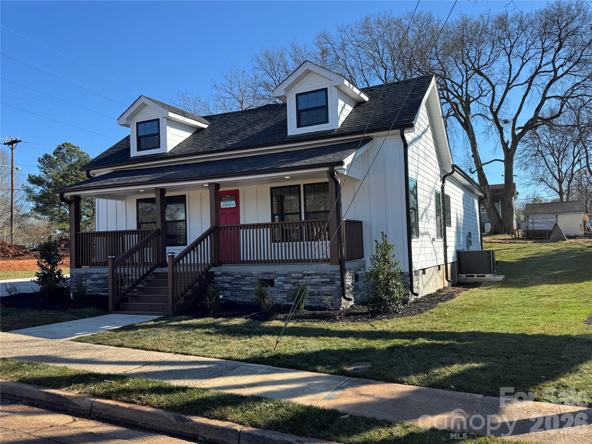 203 Lee Street Fort Mill, SC 29715 - Photo 2 of 16 a front view of a house with a yard