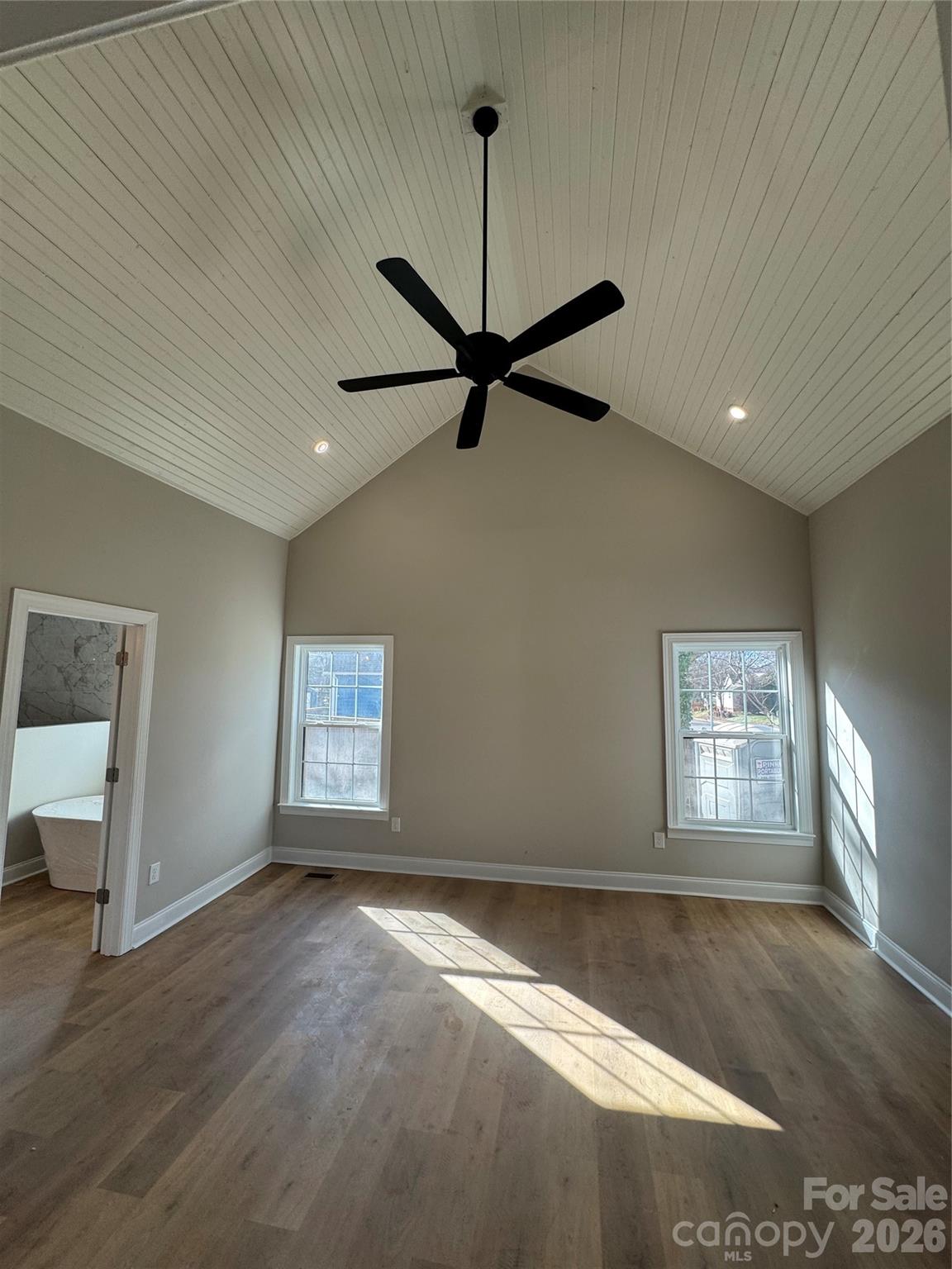 203 Lee Street Fort Mill, SC 29715 - Photo 5 of 16 a view of a livingroom with a ceiling fan and window