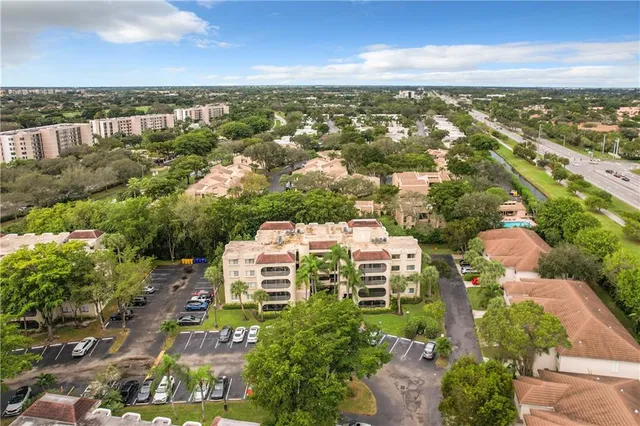 an aerial view of residential building with outdoor space