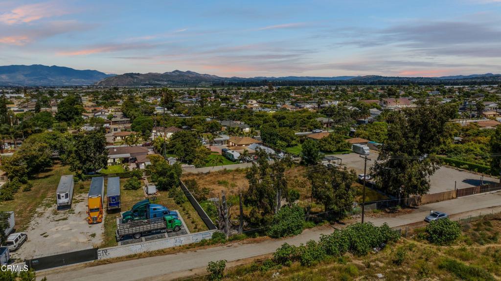 0 Rio School Lane Oxnard, CA 93036 - Photo 5 of 7 an aerial view of residential houses with outdoor space and trees