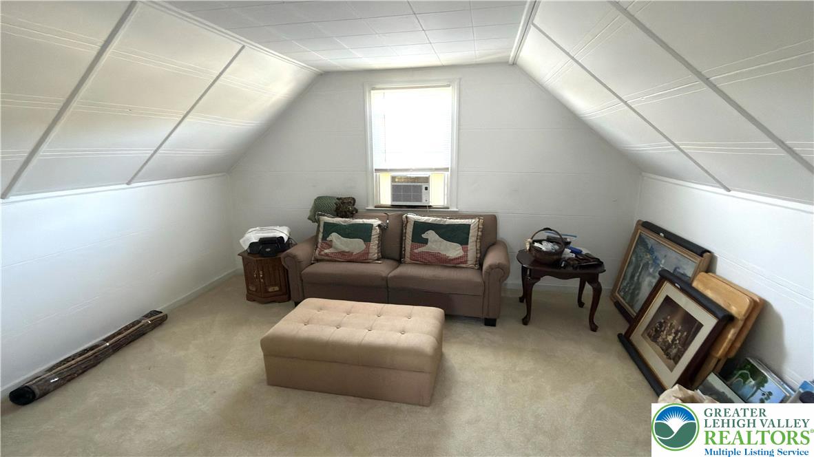 462 Maple Road Hellertown, PA 18055 - Photo 19 of 25 a bedroom with furniture and a window