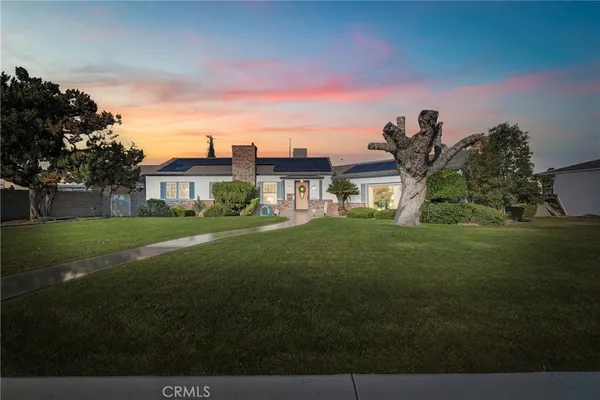 a house view with garden space