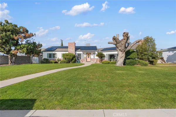 a front view of a house with a garage
