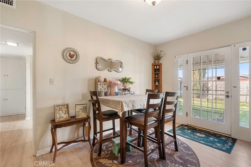 1000 1st Street Wasco, CA 93280 - Photo 30 of 75 a view of a dining room with furniture window and wooden floor