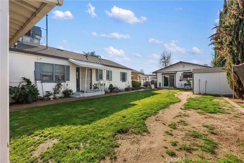 1000 1st Street Wasco, CA 93280 - Photo 54 of 75 a front view of house with yard and green space
