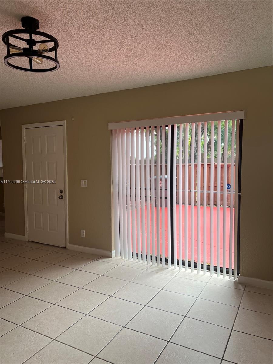 8063 Severn Drive, Unit D Boca Raton, FL 33433 - Photo 8 of 20 a view of a livingroom with a window