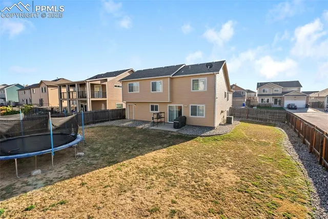 a house view with a swimming pool
