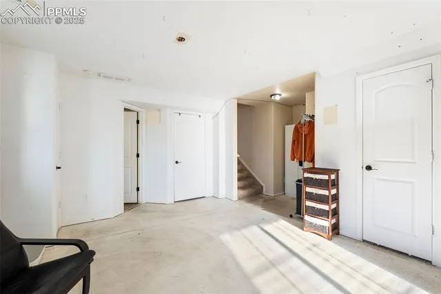 a view of a bedroom with closet area