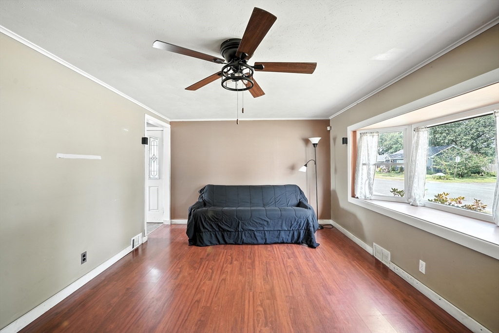 721 Pendleton Avenue Chicopee, MA 01020 - Photo 22 of 36 a living room with a couch and a window