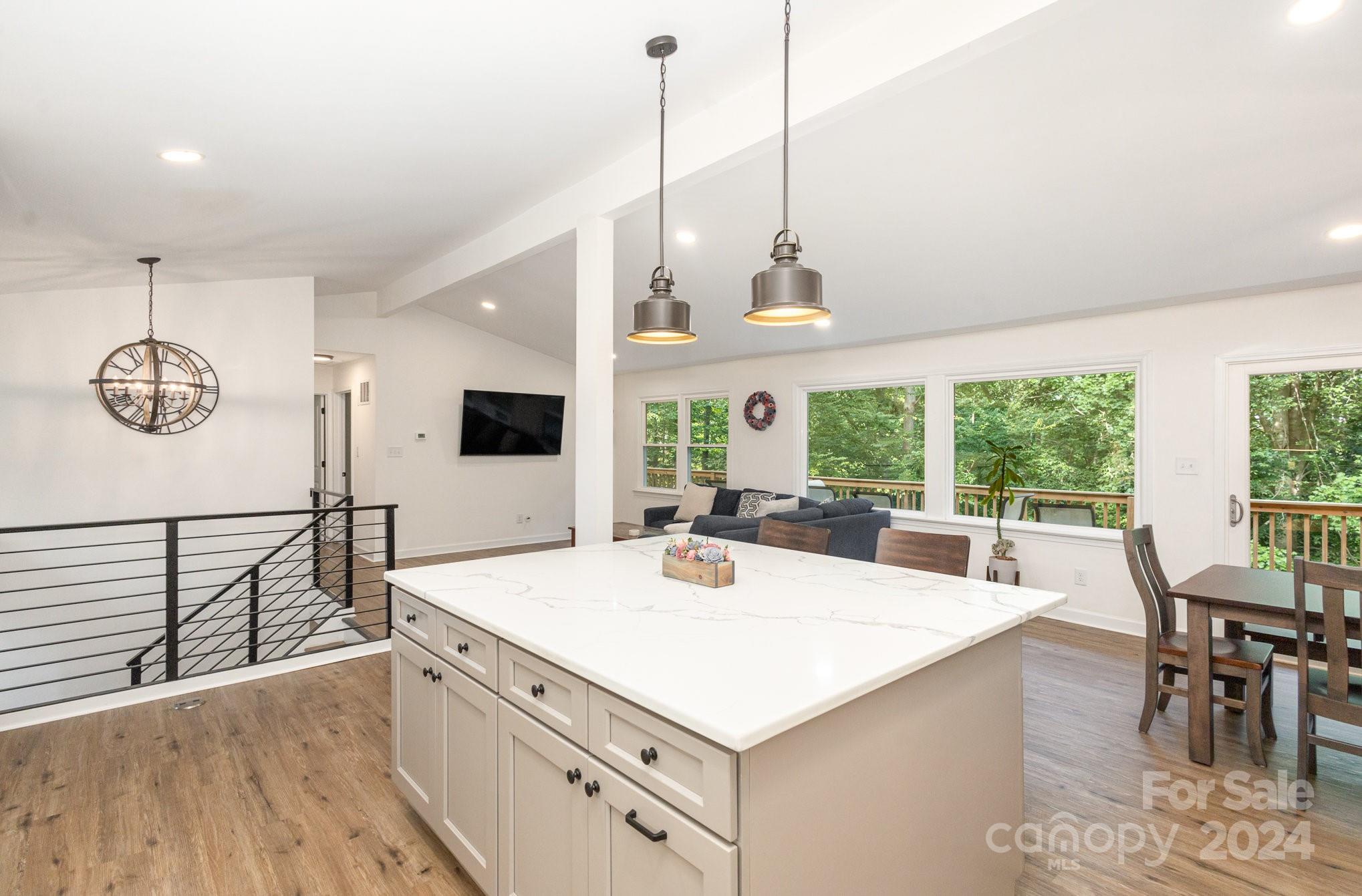 10625 East Lake Road Charlotte, NC 28215 - Photo 11 of 44 a view of a dining room and furniture window and outside view