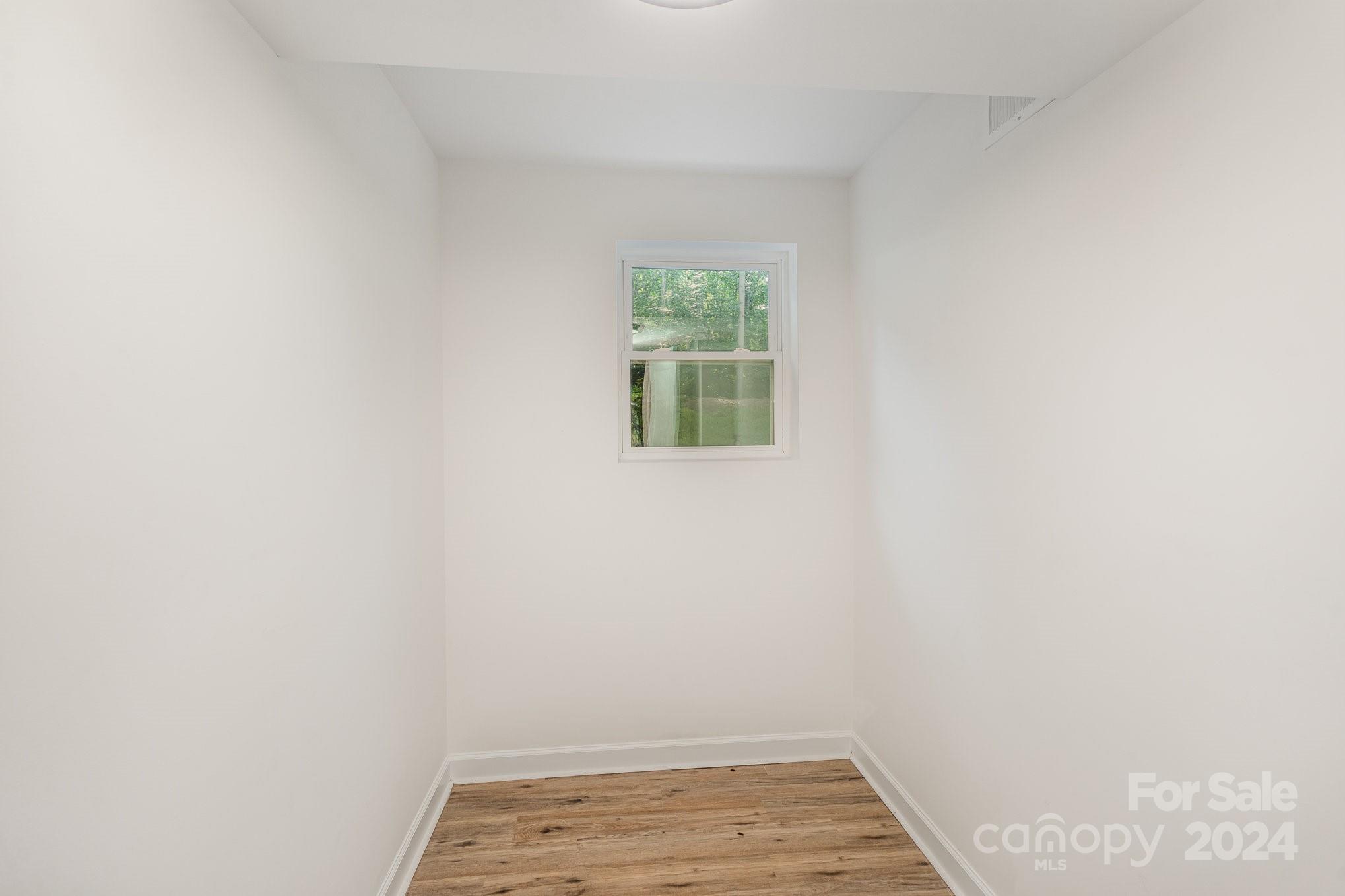 10625 East Lake Road Charlotte, NC 28215 - Photo 31 of 44 a view of empty room with window