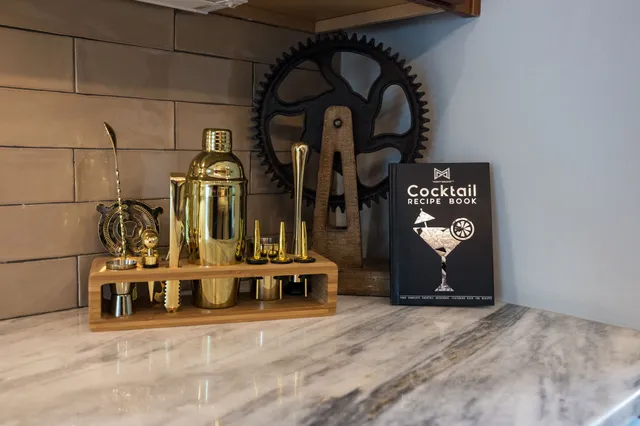 a bedroom with a bed and a potted plant
