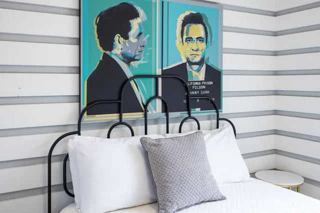 a view of a chairs and table in a balcony