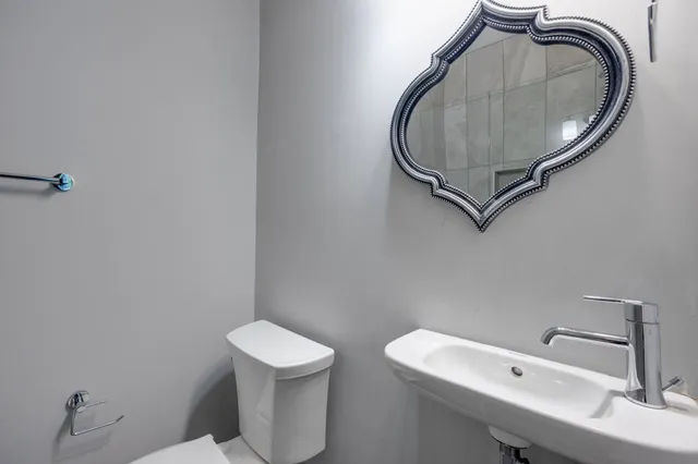a view of a hallway with washer and dryer