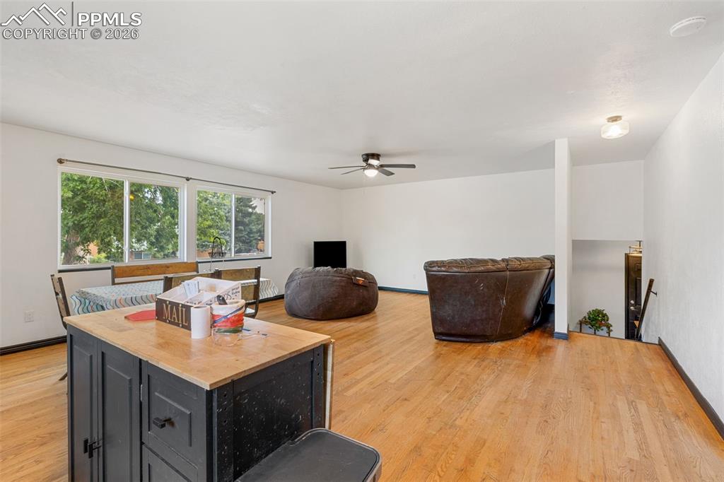 336 Harvard Street Colorado Springs, CO 80911 - Photo 6 of 27 a bedroom with a large bed and a large window