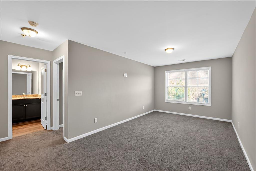 3369 Hidden Stream Court Stockbridge, GA 30281 - Photo 18 of 22 a view of an empty room with a window