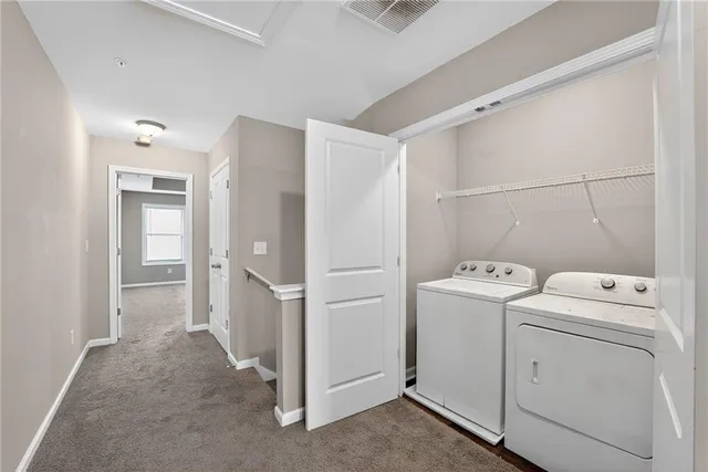 a view of utility room with washer and dryer