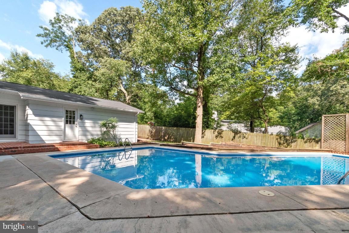 228 Falcon Drive Pasadena, MD 21122 - Photo 35 of 51 POOL HAS NEWW FILTER AND PUMP