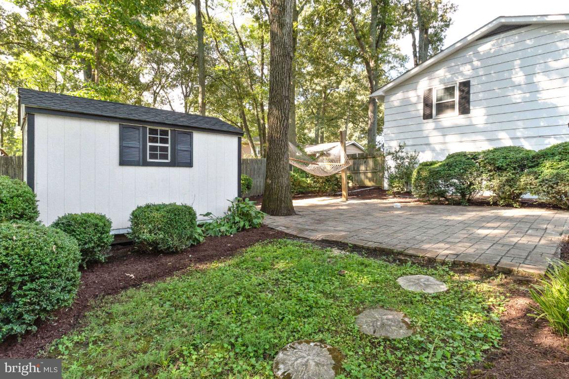228 Falcon Drive Pasadena, MD 21122 - Photo 41 of 51 REAR PATIO AND HED