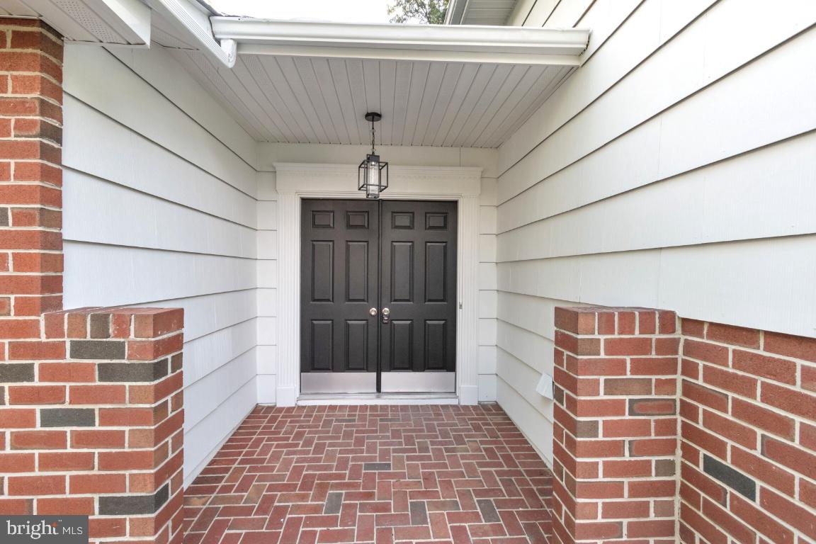 228 Falcon Drive Pasadena, MD 21122 - Photo 5 of 51 COVERED FRONT ENTRANCE WITH DOUBLE DOOR ENTRY