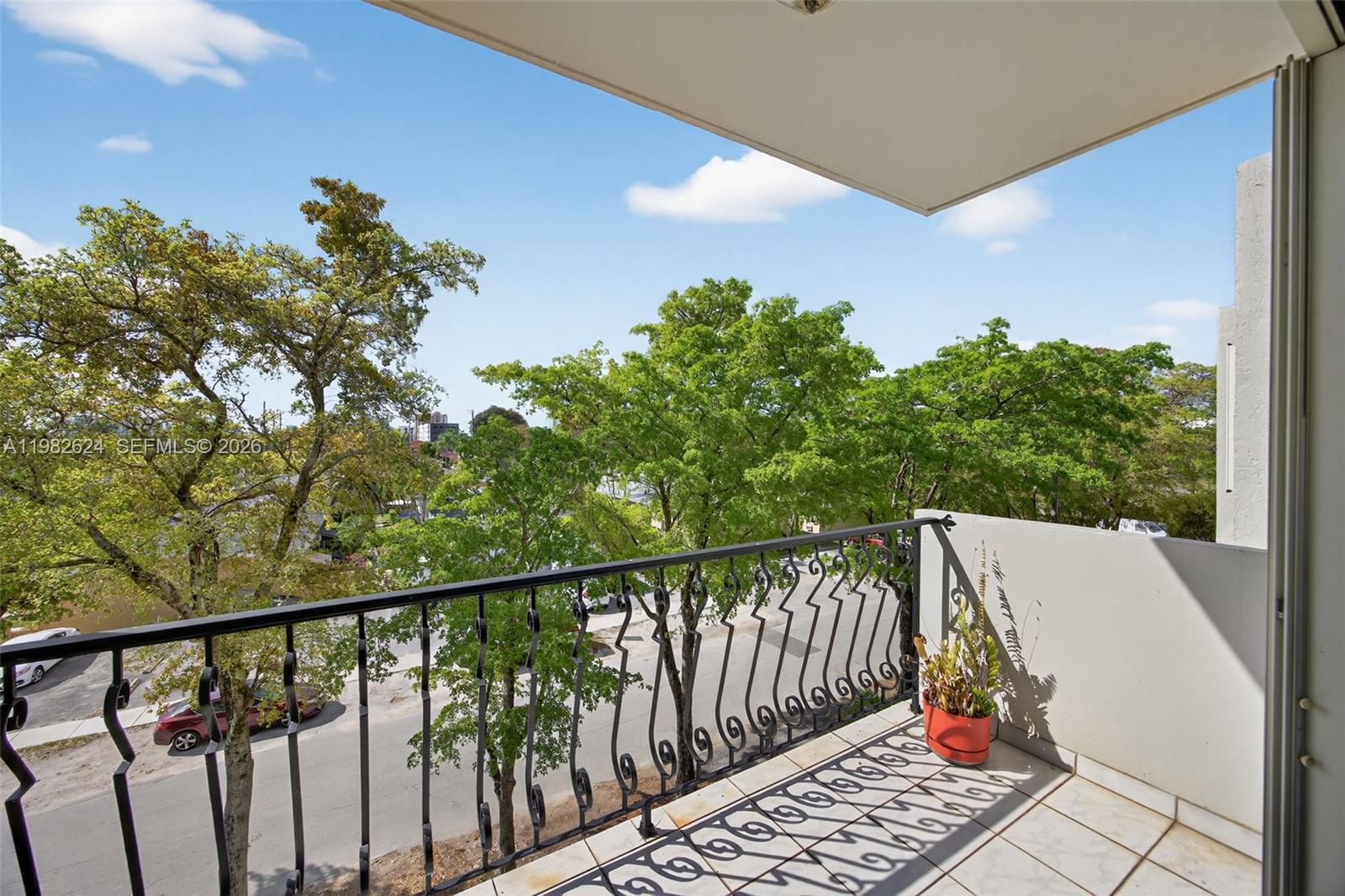 3181 Southwest 13th Street, Unit 416 Miami, FL 33145 - Photo 21 of 40 a view of balcony with wooden floor