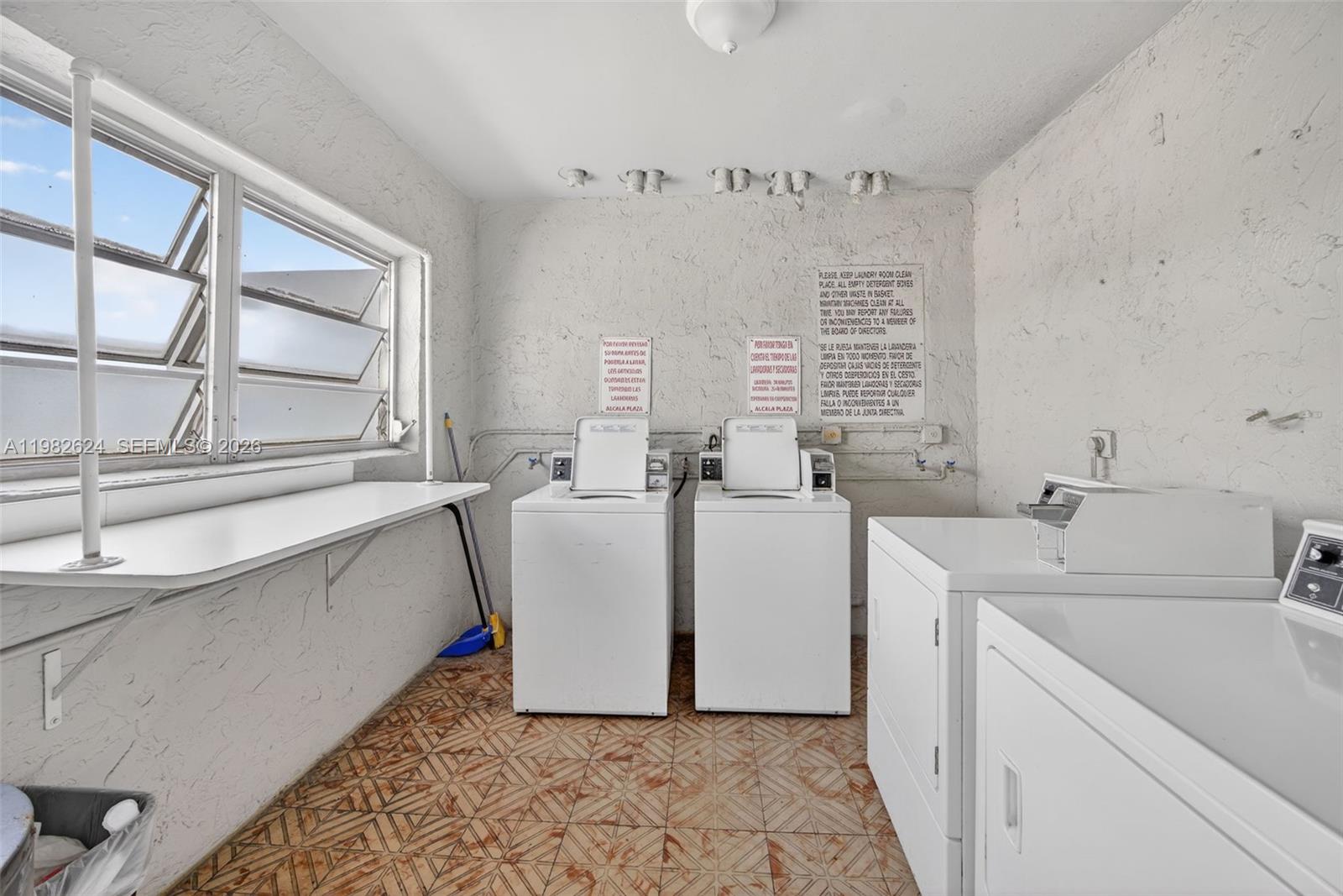 3181 Southwest 13th Street, Unit 416 Miami, FL 33145 - Photo 24 of 40 a room with a sink and a window