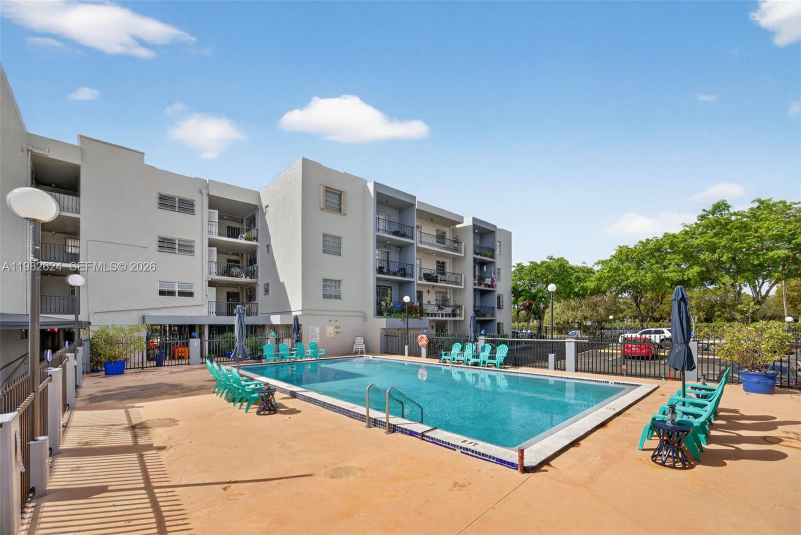 3181 Southwest 13th Street, Unit 416 Miami, FL 33145 - Photo 30 of 40 a view of a building with a backyard