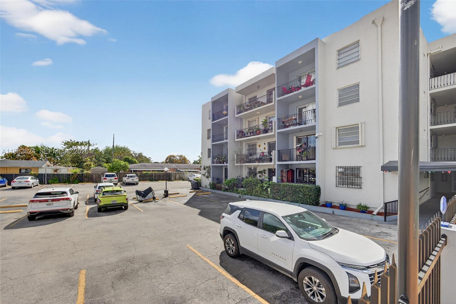 3181 Southwest 13th Street, Unit 416 Miami, FL 33145 - Photo 31 of 40 a car parked in front of a building